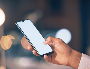 Image showing Smartphone, mockup screen and hand of woman for internet, social media and networking online at night. Communication, office and worker with blank phone for mobile app, branding and website logo