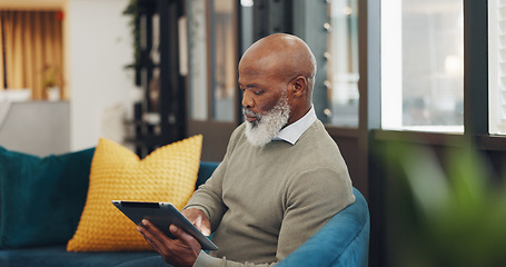 Image showing Tablet, technology and senior black man on sofa browse online website, social media and internet. Online shopping, retirement and elderly male enjoy freedom, weekend and relax with digital tech