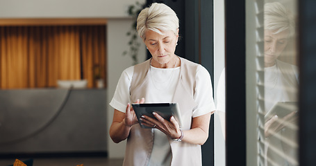 Image showing Mature business woman, tablet or window thinking of digital marketing ideas, advertising innovation or calendar management. Manager, ceo or leadership and technology, modern office research or review