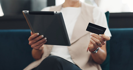 Image showing Woman, tablet and credit card for ecommerce, online shopping and paying bills while on a couch reading details or information for payment. Hands of female doing online banking with wifi network