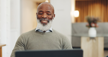 Image showing Earphones, laptop and black man on video call in office, online meeting or video conference. Webinar, mature and.businessman talking on computer in virtual meeting, workshop or interview video