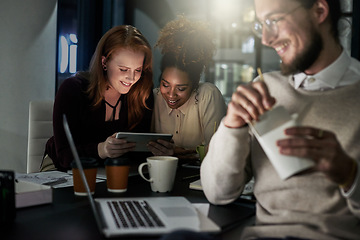 Image showing Technology, teamwork and night with business people working late on a deadline in their office. Collaboration, diversity and project management with an employee team at work in the dark for overtime