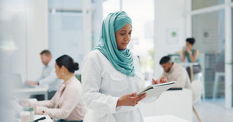 Image showing Office, business and muslim woman on tablet for research, internet browsing or social media. Technology, break and mature Islamic female holding touchscreen for networking, typing or writing email.