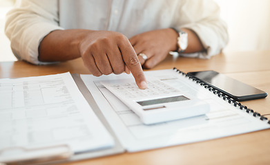 Image showing Calculator, finance and planning with hands of black woman for budget, payment and savings calculation. Tax, audit and documents with lady at home for banking expenses, bills and invoice paperwork