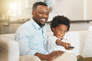 Image showing Black family, sofa and father with boy with remote for tv channel, streaming movies and watching film. Love, home and happy dad with child with television control for entertainment, cartoon and relax