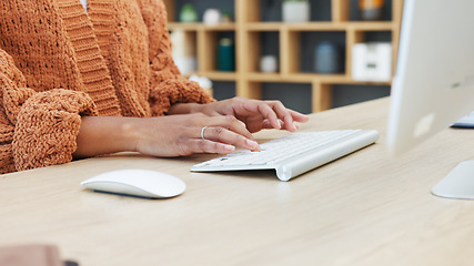 Image showing Closeup of woman hands typing on a keyboard while sitting at a desk and sending an email in a modern office. Journalist doing online research for an article. Freelance employee working remotely