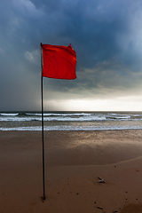 Image showing Storm warning flags on beach. Baga, Goa, India