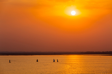 Image showing Yacht boats in lake on sunset