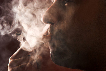 Image showing smoking man