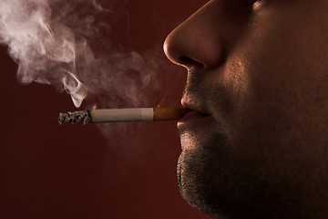 Image showing smoking man