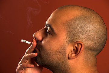 Image showing smoking man