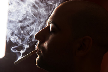 Image showing smoking man