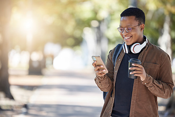 Image showing Social media, happy and black man with a phone and coffee for communication, connection and chat. Mockup, smile and African student reading a notification on a mobile app with a drink on a campus