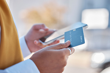 Image showing Woman hands, credit card and phone online shopping, ecommerce or financial payment on 5g cellphone or web 3.0. Young person outdoor on smartphone for fintech, digital mobile app and banking services