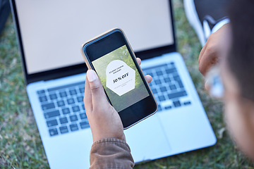 Image showing Hands, phone and laptop mockup screen for discount, sale or advertising announcement and news outdoors. Hand of man on smartphone app with display by computer for special marketing deal in nature