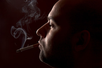 Image showing smoking man