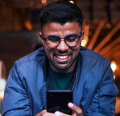 Image showing Cafe, smile and face of man on smartphone for texting, reading online website and social media. Communication, networking and happy male freelancer on phone typing message, email and browse internet