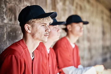 Image showing Baseball, team and dugout with a sports man watching a competitive game outdoor during summer for recreation. Sport, teamwork and waiting with a male athlete on the bench to support his teammates