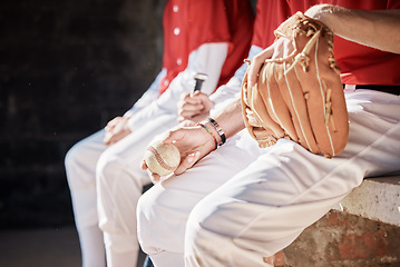 Image showing Baseball player, pitcher and leather glove with sport ball with sports team sitting together. Exercise, athlete and workout of a contest pitch outdoor with fitness gear ready for training and game