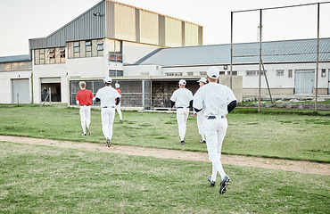 Image showing Sports, baseball and team running on the field for a match, exercise or training at a stadium. Fitness, softball and group of male athletes preparing for game, workout or practice on a pitch at arena