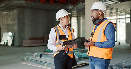 Image showing Construction, inspection and clipboard, black man and woman discussion, construction site with scaffolding and building renovation checklist. Contractor with inspector, engineering and communication.