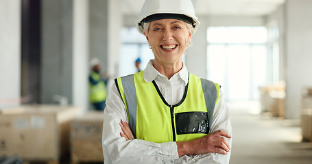 Image showing Senior woman, architect and smile with arms crossed in success for industrial architecture or construction site. Portrait of confident elderly female engineer or building contractor smiling at work