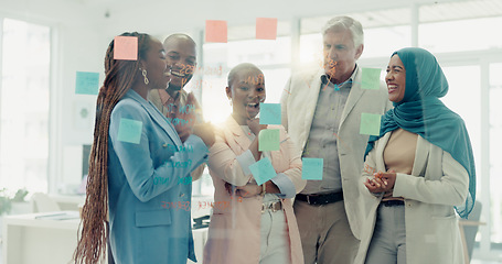 Image showing Business people, planning with glass board and collaboration with postit notes for brainstorming, communication and ideas. Vision, diversity and teamwork with Muslim woman writing, strategy and goals