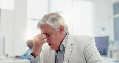 Image showing Business man, stress and reading paperwork or documents while thinking and working in a office while tired and burnout at a desk. Senior executive holding a paper for budget, report or audit