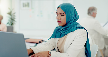 Image showing Muslim, business woman and typing on computer in office, startup company and digital management, internet planning and strategy review. Employee with islamic hijab working online for seo website tech