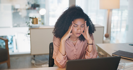 Image showing Laptop, business and black woman stress, tired or headache in office fatigue, anxiety or depression. Sad, depressed and mental health risk of digital, online worker or employee burnout and crisis