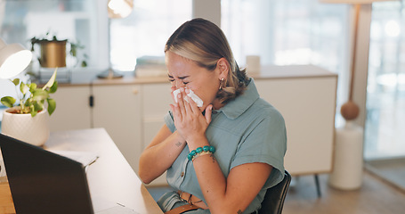 Image showing Woman, covid and sinus in office with sneeze, tissue and runny nose while working on laptop. Business woman, allergies and unwell corporate employee sneezing and suffering flu, cold and allergy