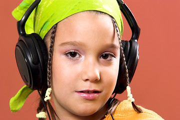 Image showing child listening music