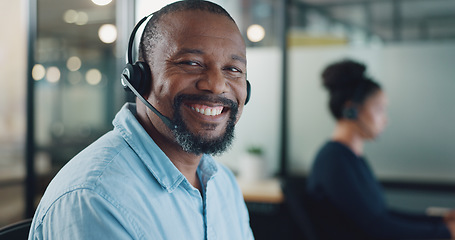 Image showing Call center, customer support and face of black man at desk working on computer, online and telemarketing. Crm, contact us and portrait of consultant for friendly service, help and customer service