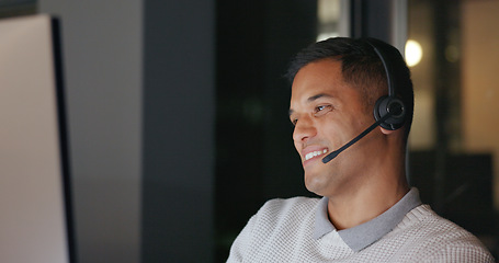 Image showing Telemarketing, overtime and crm, man in customer service talking with headset. Late night work, call center agent or sales consultant with smile with advisory support, help and consulting in office.