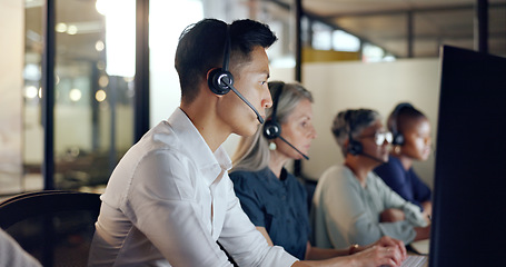 Image showing Senior call center consultant, woman and contact us, CRM and talking in customer service, computer at desk. Phone call, telemarketing and diversity, writing in notebook in coworking space and headset