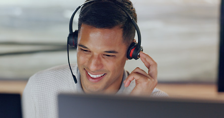 Image showing Telemarketing, overtime and crm, man in customer service talking with headset. Late night work, call center agent or sales consultant with smile with advisory support, help and consulting in office.