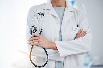 Image showing Medicine, stethoscope and a doctor with arms crossed for healthcare, hospital work and cardiology. Insurance, nursing and a gp ready for a consultation, surgery or medical service at a clinic