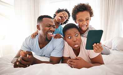 Image showing Selfie, funny and black family on the bed with a tablet for communication, memory and comedy. Crazy, comic and African children taking a photo on tech with parents for bonding and quality time