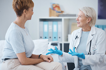 Image showing Consulting, healthcare and woman speaking to a doctor about a surgery, medical attention or plan. Support, medicine and mature patient talking to a gp about cardiology, strategy or health advice