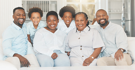 Image showing Happy, together and portrait of a black family on a sofa for bonding, visit or quality time. Smile, group and African parents, children and grandparents on a couch for generations in the lounge