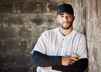 Image showing Baseball, serious and portrait of man with ball ready for game, match and practice in stadium. Softball mockup, motivation and male player focus in dugout for training, exercise and sport competition