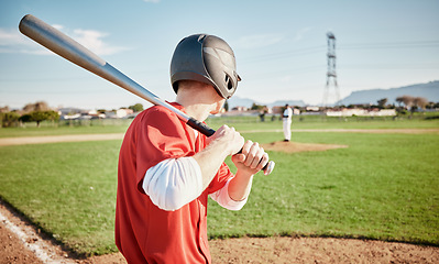 Image showing Baseball, bat and field with a sports man outdoor, playing a competitive game during summer. Fitness, health and exercise with a male athlete or player training on a pitch for sport or recreation