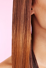 Image showing Hair care, brunette and woman with a straight hairstyle isolated on a pink background in a studio. Growth, health and girl with a keratin treatment, smooth and silky style from shampoo on a backdrop
