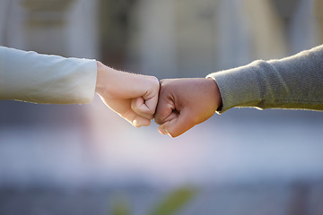 Image showing Motivation, support and people with a fist bump for partnership, goal and teamwork. Thank you, community and friends with a hand gesture for collaboration, connection and solidarity in the city
