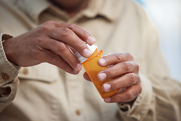 Image showing Medication, healthcare and male hands with pills for recovery, wellness and health in his home. Medicine, medical emergency and mature man taking tablets for a flu, cold or sickness in his house.