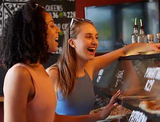 Image showing Happy woman or friends order pizza at restaurant for lunch or dinner at small business startup and gen z lifestyle. Young diversity people at counter for fast food choice on sale, discount or deal