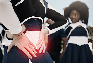 Image showing Cheerleader, sports or woman with back pain, injury or accident on field in game or training match. Red glow, fitness or cheerleading girl athlete with medical emergency, body joint or muscle sprain