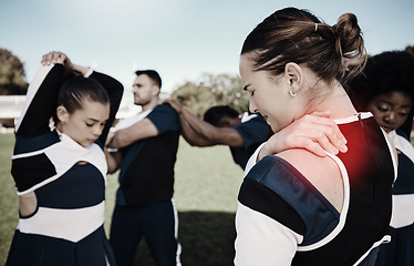 Image showing Cheerleader, sports or woman with shoulder pain, injury or accident on field in game or training match. Red glow, fitness or cheerleading girl athlete with a medical emergency, joint or muscle sprain