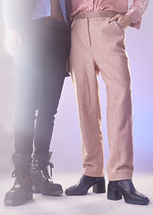 Image showing Fashion, vintage and closeup of pants in a studio for a retro, trendy and stylish outfit. Style, glitter and gay men with edgy, style and elegant clothes and boots by a purple gradient background.