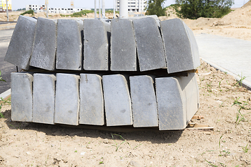 Image showing large and long concrete curbs